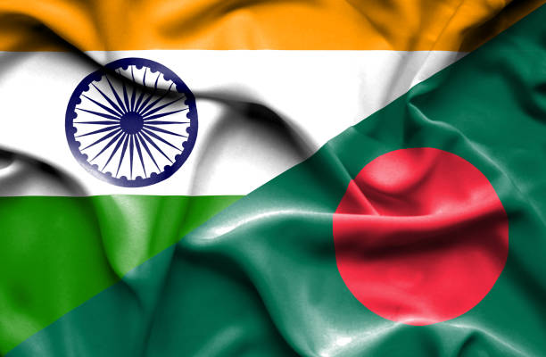 Waving flag of Bangladesh and ‘সীমান্ত উত্তেজনা নিয়ে আমরা আমাদের অবস্থান পরিষ্কার করেছি’: বাংলাদেশকে ভারত।